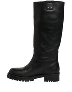 Black leather mid-calf boots with buckle detail from Dolce & Gabbana, featuring a sleek design and sturdy sole.