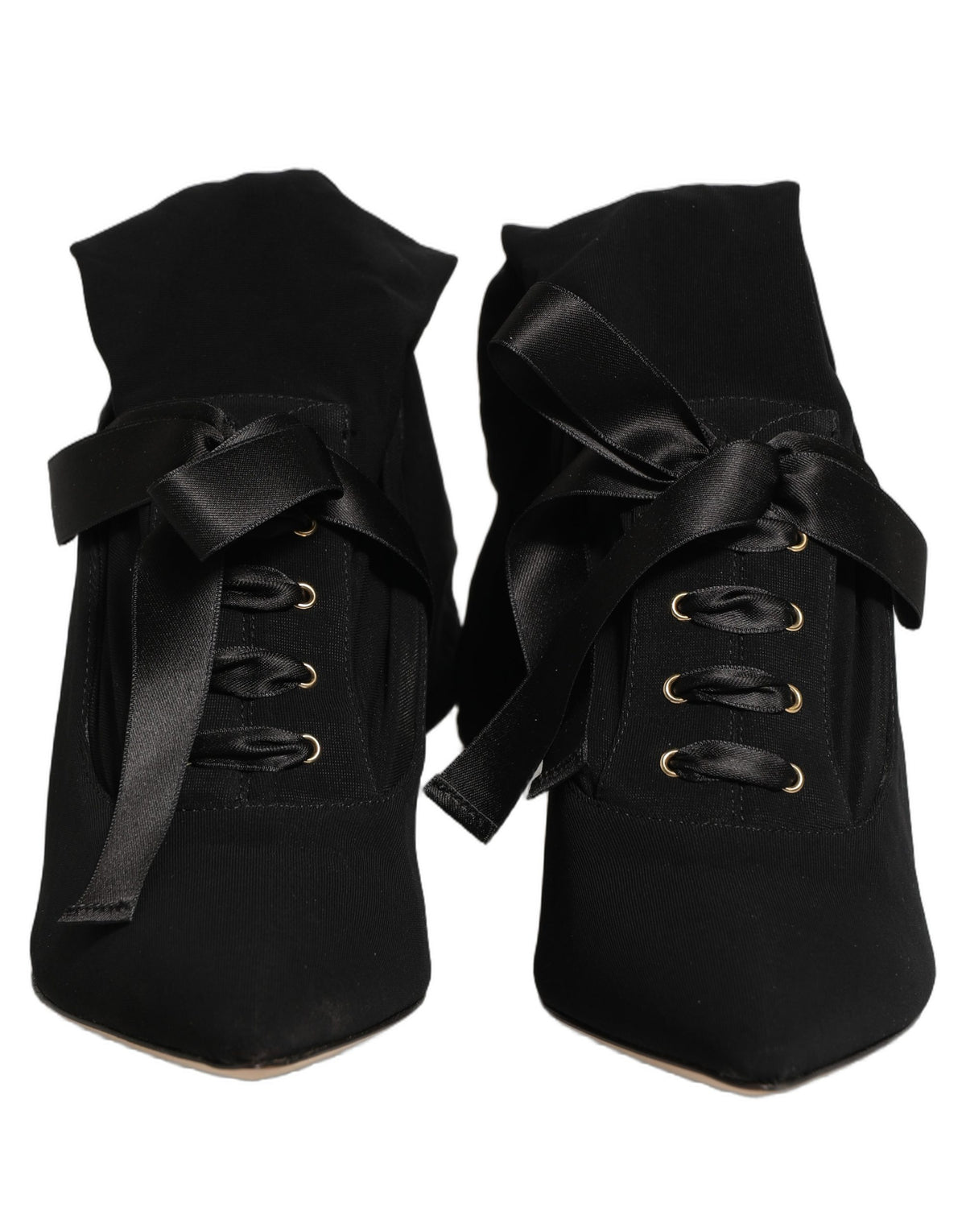 Dolce & Gabbana black stiletto heels with mid-calf boot design, featuring sleek leather and elegant silhouette.