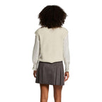 Beige polyester sleeveless sweater by Morgan De Toi, featuring a relaxed fit and subtle knit texture.