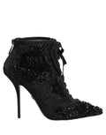 Black embellished mesh ankle boots by Dolce & Gabbana featuring intricate details and stylish design.