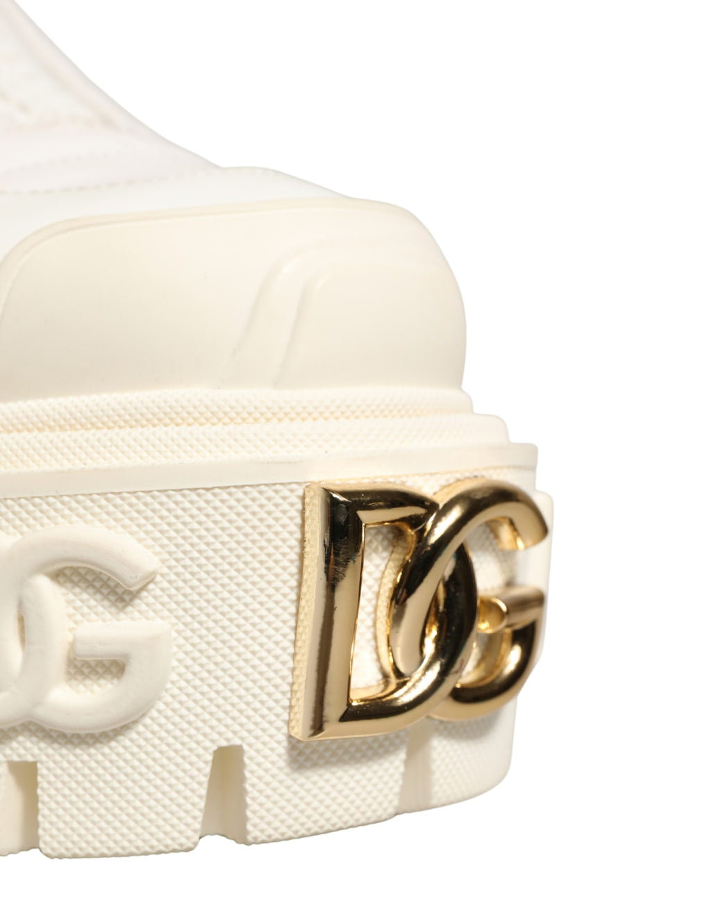Dolce & Gabbana white leather ankle boots with rubber logo detail and stylish design.