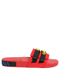 Red neoprene Dolce & Gabbana slides flats for beachwear, featuring a sleek design and comfortable slip-on style.