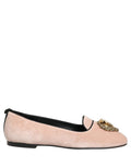 Pink velvet Dolce & Gabbana Devotion loafers with a sleek flat shoe design and elegant detailing.