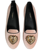 Pink velvet Dolce & Gabbana Devotion loafers with a sleek slip-on design and elegant detailing, perfect for stylish casual wear.