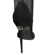 Dolce & Gabbana black nylon mesh sock-style boots with chunky sole and sleek design, showcasing modern high-fashion footwear.