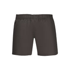 Nike Nero polyester men's swimwear with Nike logo, featuring a sleek black design and comfortable fit for swimming and beach activities.
