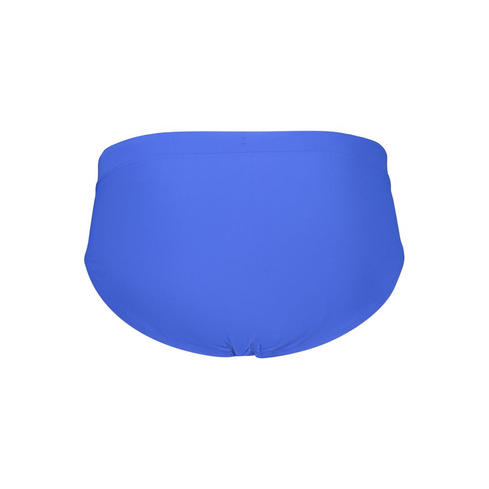 Tommy Hilfiger blue polyester men's swimwear shorts with logo waistband, casual beachwear for men.