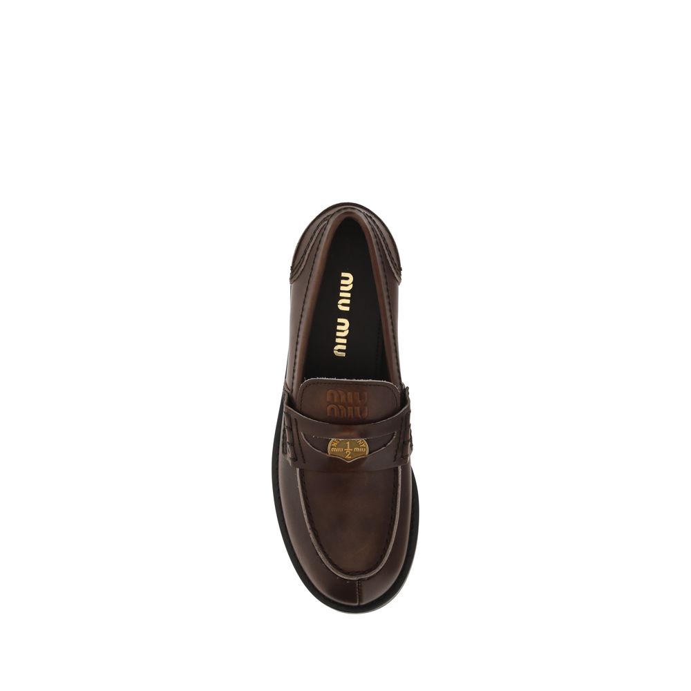 Miu Miu Brown Calf Leather Bos Taurus Slip-On Loafers Miu Miu