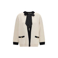 Beige cotton cardigan by Valentino Garavani with button closures and ribbed cuffs, displayed on a neutral background.