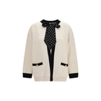 Beige cotton cardigan by Valentino Garavani with button closures and ribbed cuffs, displayed on a neutral background.