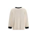 Valentino Garavani beige cotton cardigan with button closure, featuring a classic knit design and ribbed cuffs.