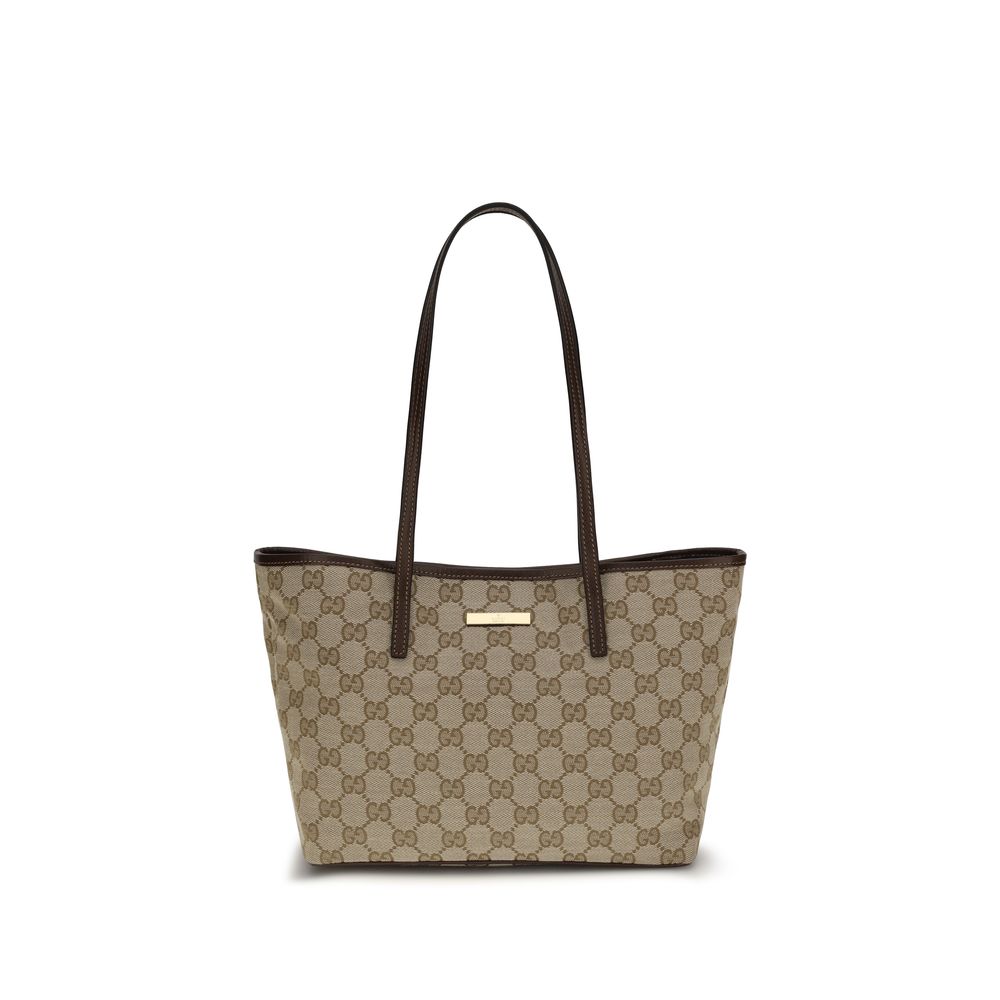 Gucci beige fabric handbag with top handles and subtle branding, showcasing a stylish and elegant accessory for everyday use.
