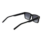 Tommy Hilfiger black acetate sunglasses with rounded frames and dark tinted lenses.