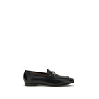 Gucci black calf leather Bos Taurus slip-on loafers with sleek design and elegant stitching, perfect for stylish casual wear.