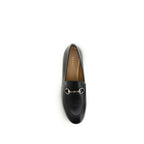 Gucci black calf leather Bos Taurus slip-on loafers with sleek design and subtle stitching.