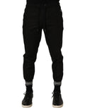 Dolce & Gabbana black cotton mid-waist jogger sweatpants with elastic cuffs and relaxed fit, ideal for casual wear.