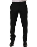 Black wool skinny leg dress trousers for men by Dolce & Gabbana, featuring a tailored fit and classic design.