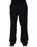 Black linen straight leg dress trousers by Dolce & Gabbana, shown on a model, with a tailored fit and minimalist style.