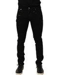 Dolce & Gabbana black embellished cotton skinny denim jeans with decorative details and a slim fit style.