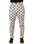Dolce & Gabbana white logo skinny leg men's trouser pants with a tailored fit and sleek design.