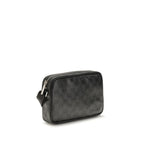 Gucci black fabric shoulder bag with adjustable strap and minimalist design, featuring subtle branding and sleek style.
