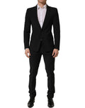 Dolce & Gabbana black wool slim fit two-piece men's suit with notch lapel jacket and matching trousers.