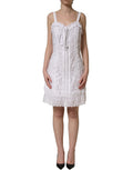 White Dolce & Gabbana broderie anglaise cotton mini dress with floral embroidery and short sleeves, elegant and stylish.