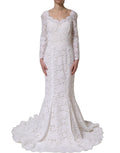 Dolce & Gabbana white floral lace mermaid long gown dress with intricate lace details and fitted silhouette.