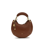 Chloé brown calf leather Bos Taurus shoulder bag with silver hardware and adjustable strap on a plain background.