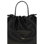Chloé black lamb leather Ovis Aries shoulder bag with sleek design and silver hardware, showcasing its elegant craftsmanship.