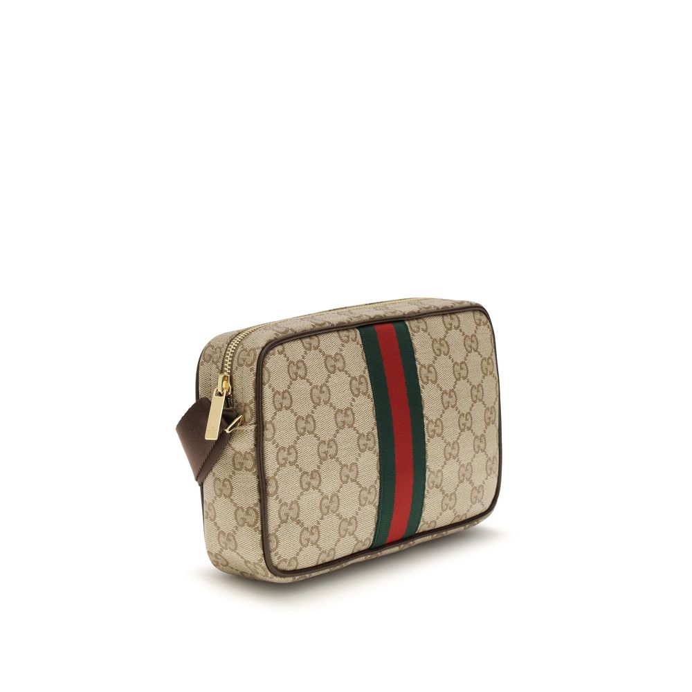 Gucci beige fabric shoulder bag with adjustable strap and subtle branding, featuring a stylish and versatile design.