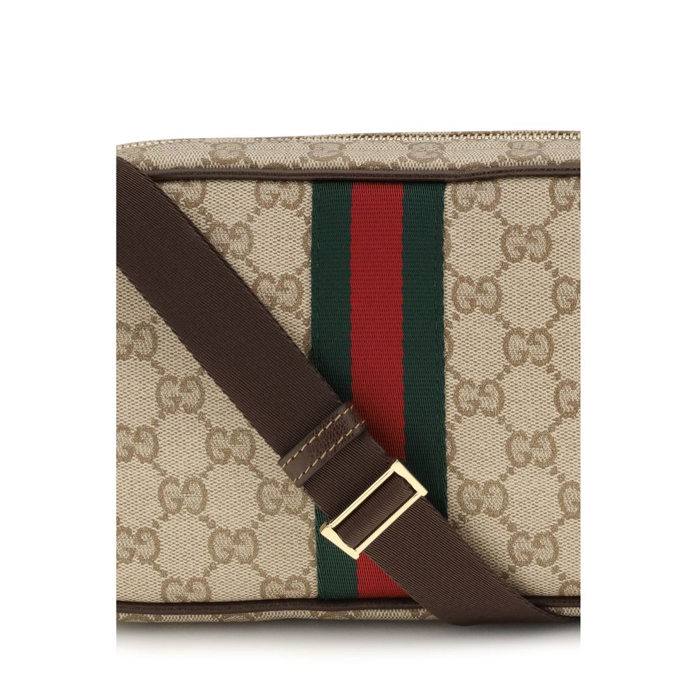 Gucci beige fabric shoulder bag with adjustable strap and subtle logo detailing, stylish and versatile accessory.