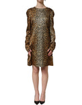 Dolce & Gabbana brown ocelot print long sleeve mini dress with fitted silhouette and stylish design.