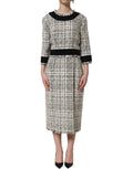 Dolce & Gabbana multicolor bouclé tweed midi dress with frayed trim, showcasing a stylish and textured design.