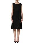 Dolce & Gabbana black floral lace sleeveless shift dress displayed on a hanger with intricate lace details.