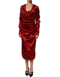 Dolce & Gabbana red silk satin draped midi dress with floral appliqué and elegant design.