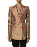 Dolce & Gabbana gold silk double-breasted coat blazer jacket displayed on a hanger, showcasing luxurious fabric and tailored fit.