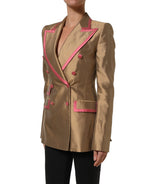 Dolce & Gabbana gold silk double-breasted coat blazer jacket with lapels and tailored fit, displayed on a hanger.