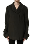 Dark green Dolce & Gabbana double-breasted peacoat jacket displayed on a hanger, showcasing its tailored fit and classic style.
