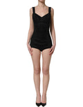 Black floral lace Dolce & Gabbana corset bodysuit with fitted bodycon design, detailed lace pattern, and elegant neckline.