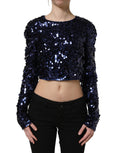 Dolce & Gabbana blue sequined long sleeve crop blouse top with elegant design and shimmering embellishments.
