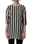 Dolce & Gabbana black and white striped round neck blouse top displayed on a hanger.
