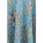 Alemais multicolor linen casual dress displayed on a hanger, featuring a relaxed fit with vibrant, multicolored fabric and lightweight texture.