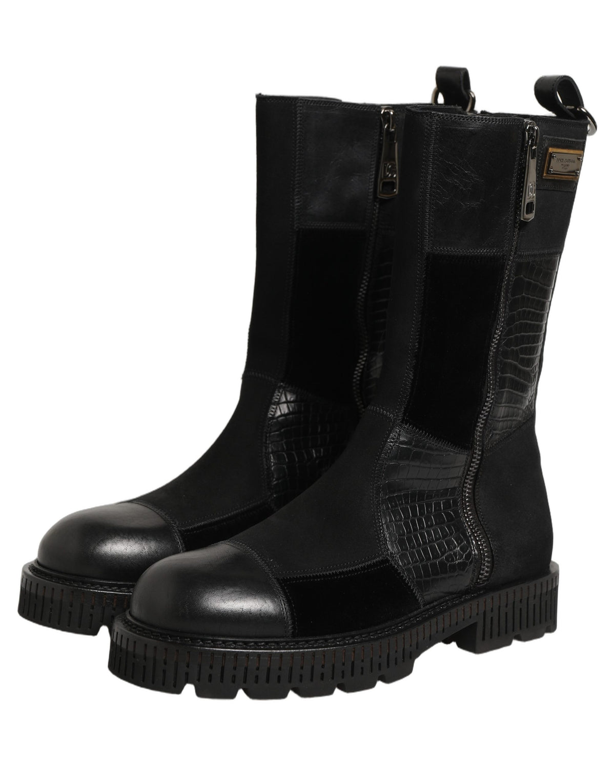 Black patchwork leather mid-calf boots by Dolce & Gabbana, featuring stylish design and sturdy heel.
