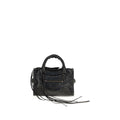 Black Lamb Ovis Aries handbag by Balenciaga featuring sleek design and structured shape with top handles and gold hardware.
