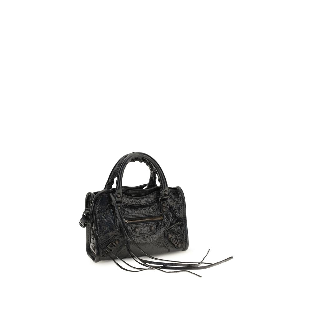 Black Balenciaga Lamb Ovis Aries handbag with sleek design and top handles, featuring a textured leather finish.