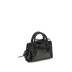 Black Balenciaga Lamb Ovis Aries handbag with sleek design and gold-tone hardware, featuring top handles and signature style.