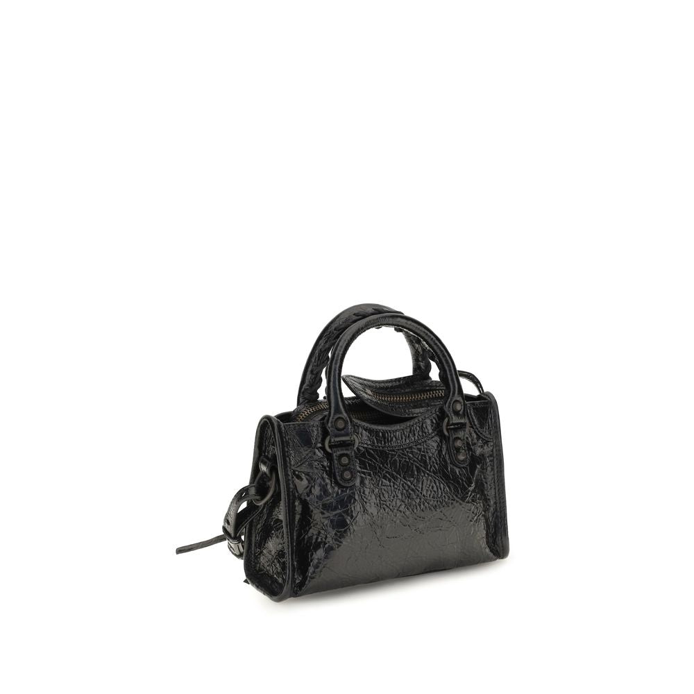 Black Balenciaga Lamb Ovis Aries handbag with sleek design and gold-tone hardware, featuring top handles and signature style.
