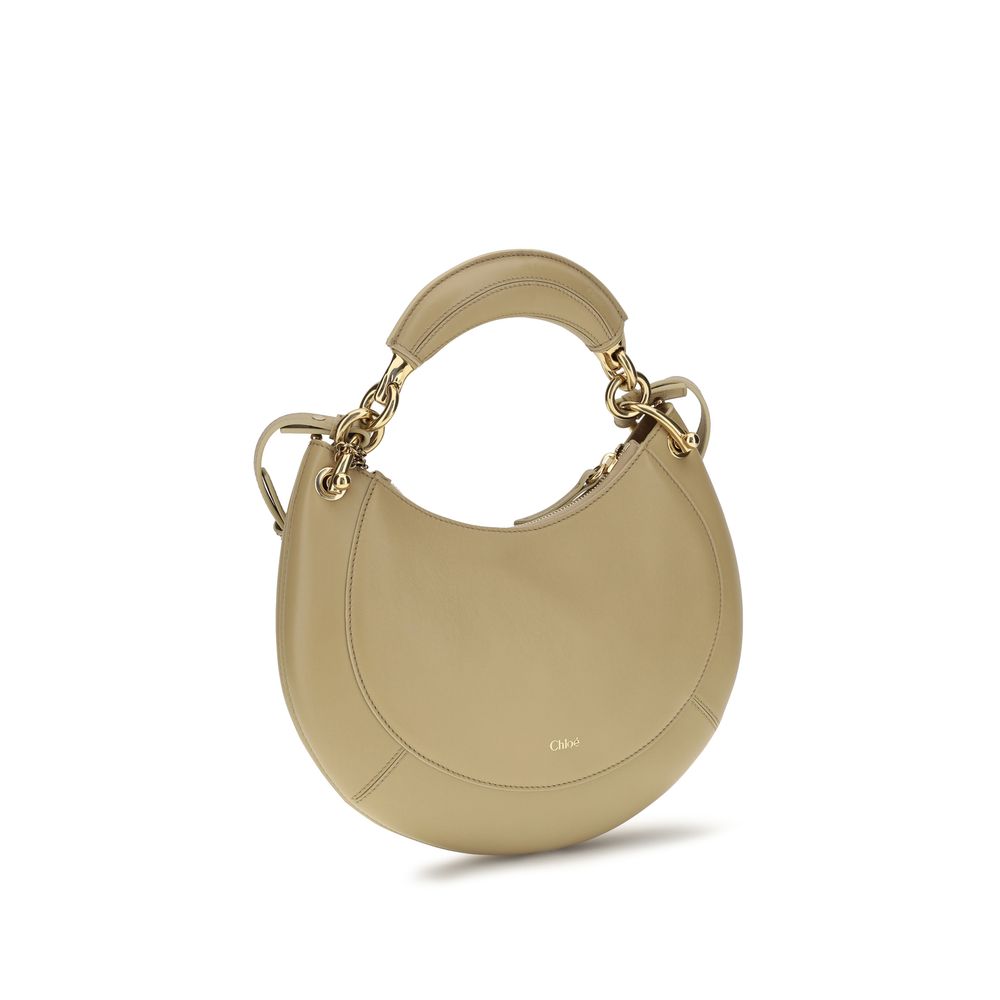 Chloé beige calf leather Bos Taurus shoulder bag with silver hardware and adjustable shoulder strap.