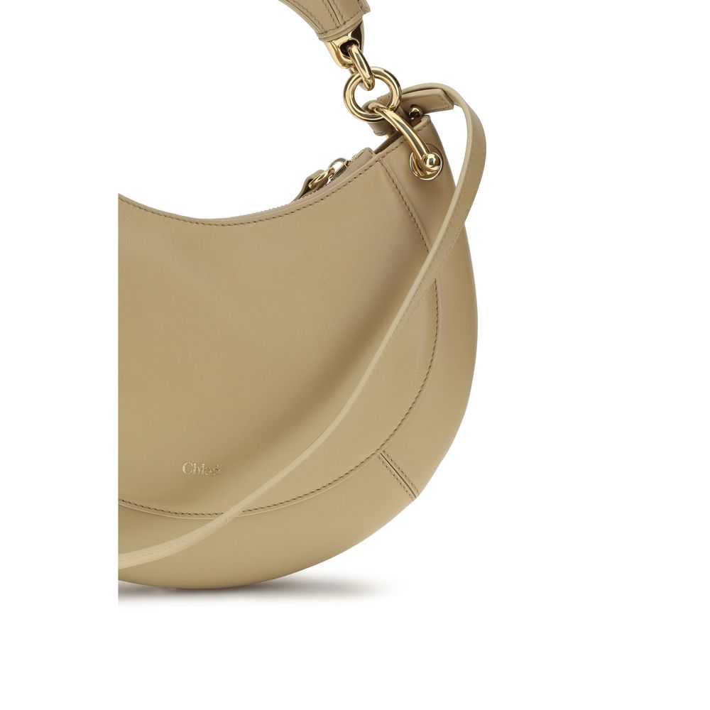 Chloé beige calf leather Bos Taurus shoulder bag with gold hardware, featuring a structured design and top handle.